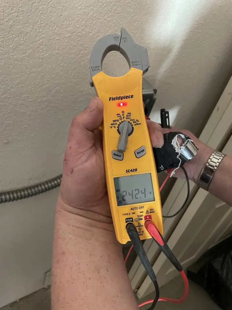 Voltage testing with clamp meter during Electrical Installation Services in Southwest Ranches